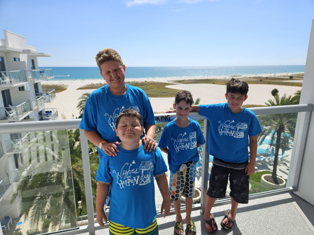 Archer and bros on balcony