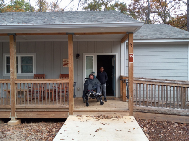 Emanuel in front of Cabin