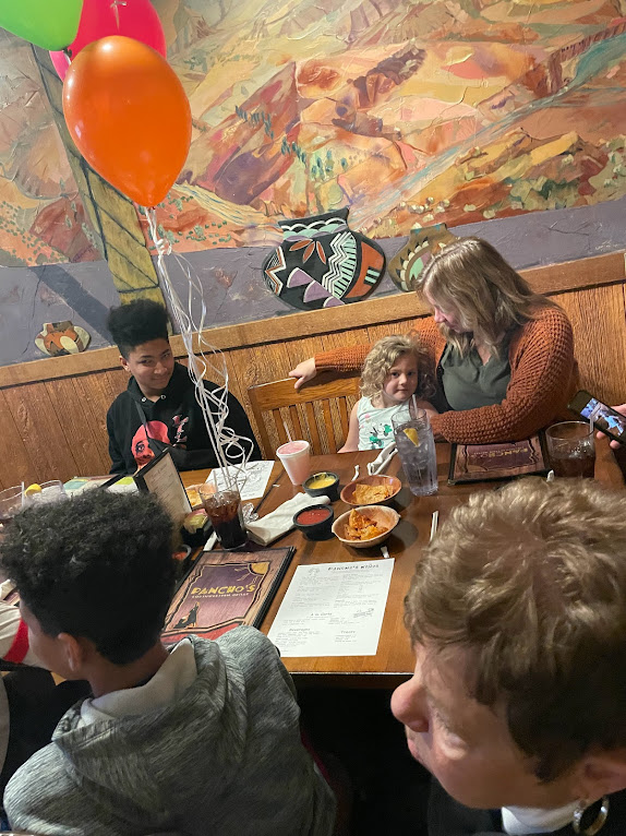 Mom talking to Elise while Moana Sings