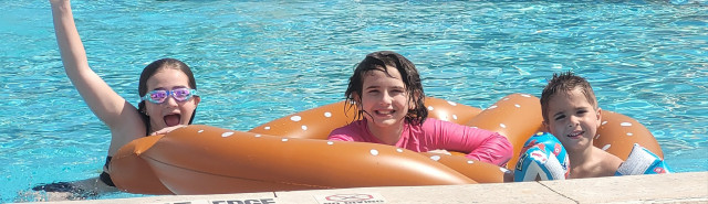 Jackson and sibs in pool