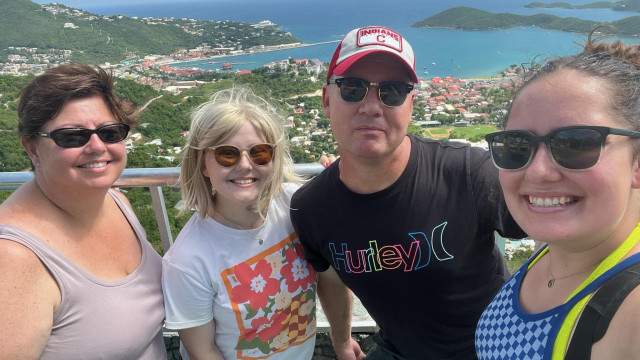 Family on Balcony of Condo