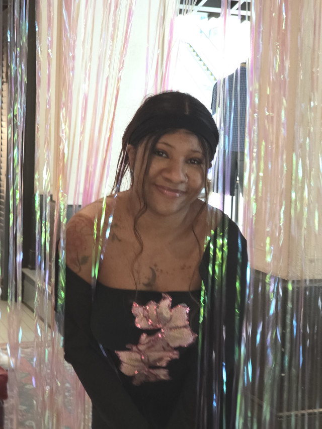LaNiya walking thru streamers 1