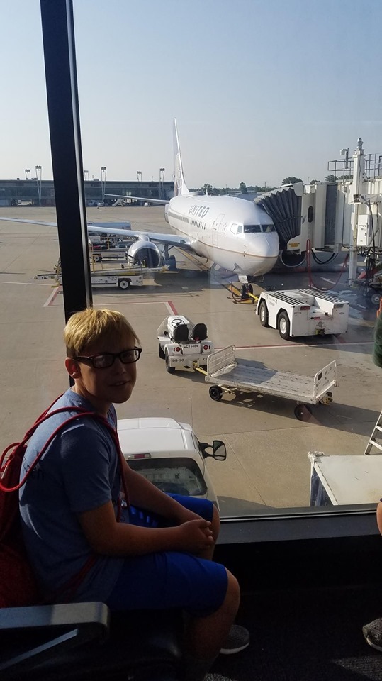 Peyton waiting at airport